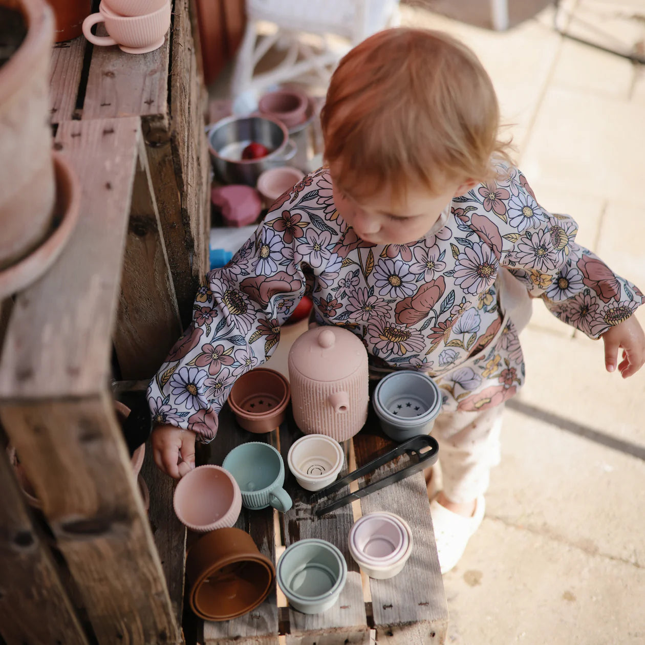 Photo de bavoirs manches fleurs mushie 2 par Les Biscottes