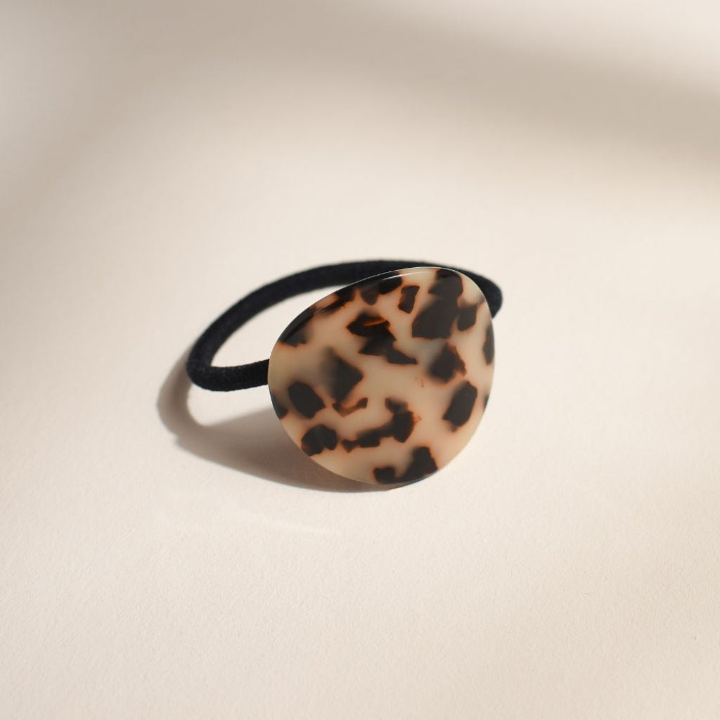 Photo de elastique plaque ecaille 1 par Les Biscottes