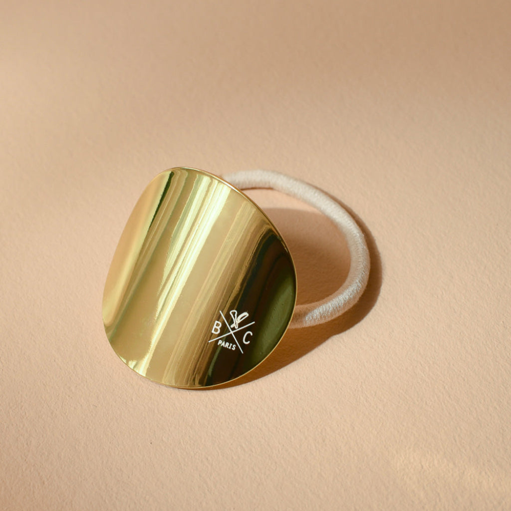 Photo de elastique plaque ronde doree bachca 1 par Les Biscottes